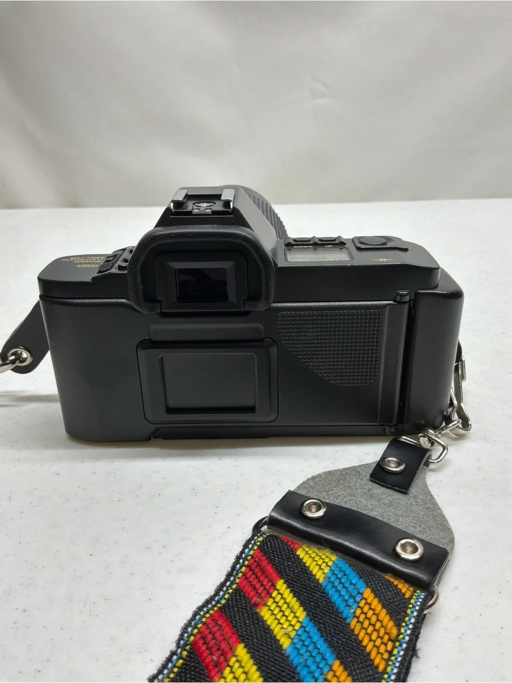 Canon T70 35mm SLR Camera with Black Telephoto Lens and Accessories